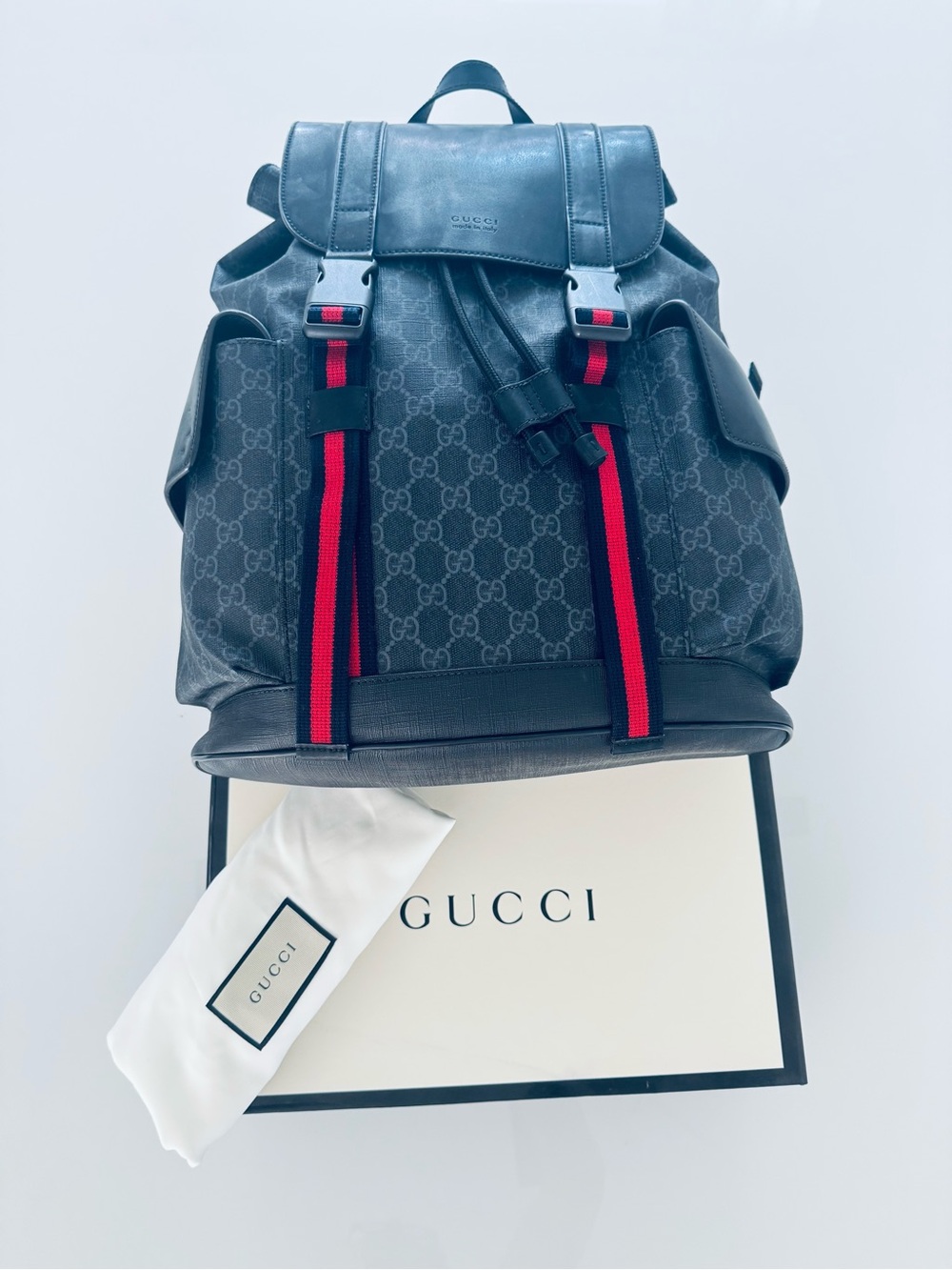 Gucci Black GG Supreme Backpack with Red Webbing
